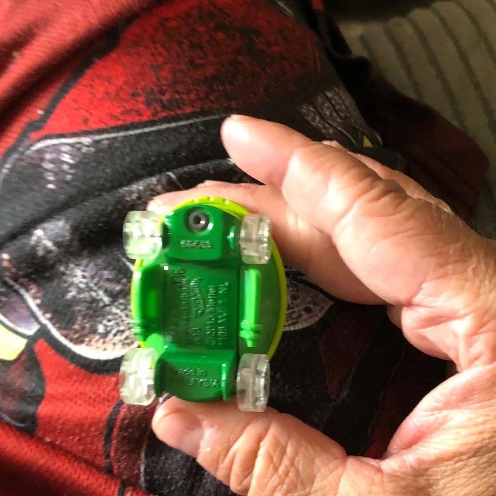 Green Electronic Wearable Tracker - Compact Clip-On